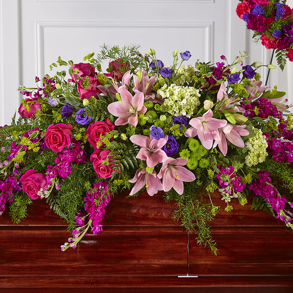 Radiant Tribute Casket Spray – Flowers By Josie, Grayling MI
