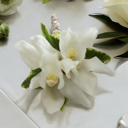 White Mini Cymbidium Boutonniere –  Flowers By Josie, Grayling MI